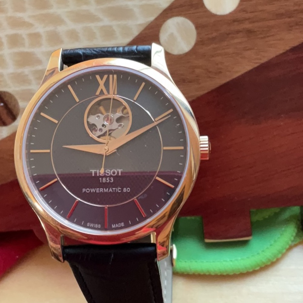 Tissot Powermatic open heart watch